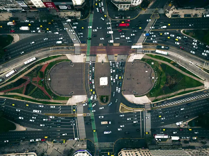Straight-down aerial of an urban interchange and roundabout